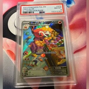 2023 Pokémon Crocalor Card PSA 8